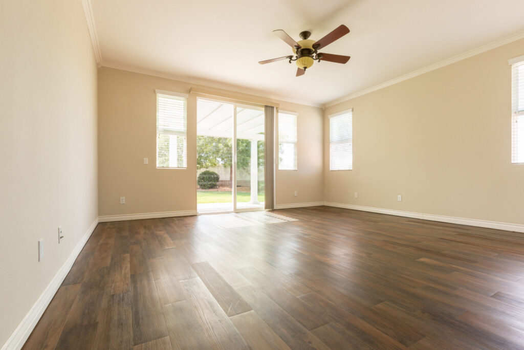 Denver home interior with hardwood floors and sliding glass doors for improved appeal