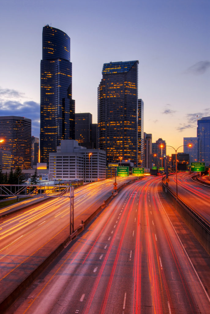 Atlanta, Georgia city skyline and highway lights illustrating contact information and editorial submissions for Force