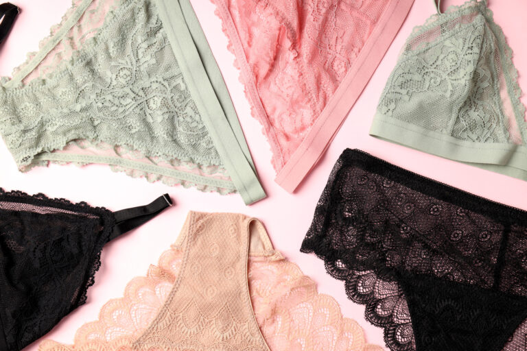 Women's underwear set on pink background, lifestyle and fashion elements.